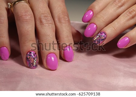 Pink manicure design with butterfly and rhinestones