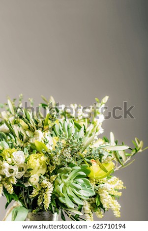Light romantic bouquet from various colors. Creation. Floristics