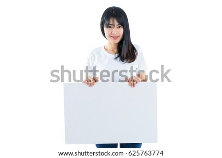 Young woman asian showing blank empty billboard poster sign. Isolated on white background.