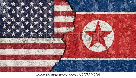 USA North Korea flag cracked wall background
