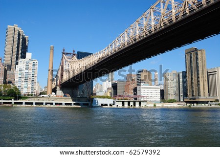 Skyline of midtown Manhattan with the Queensboro Bridge from across the East River.