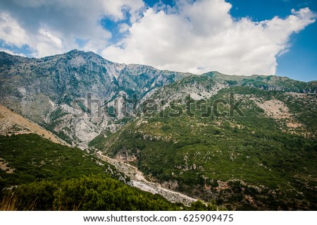 2016, Albania, Llogara National Park, Llogara Pass. Vlore county, view to the bay and beach Royalty-Free Stock Photo #625909475