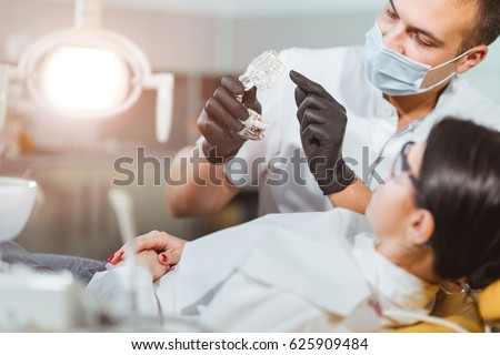 Medical treatment at the dentist office Royalty-Free Stock Photo #625909484