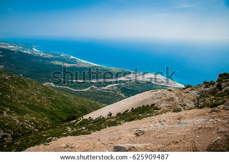 2016, Albania, Llogara National Park, Llogara Pass. Vlore county, view to the bay and beach Royalty-Free Stock Photo #625909487