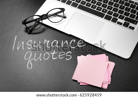 Text INSURANCE QUOTES, laptop and glasses on blackboard background