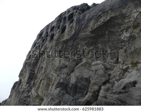 Luoyang / Longmen grottoes / picture showing some of the caves and sculptures in the Longmen Grottoes complex in Luoyang, China. Taken in October 2015.