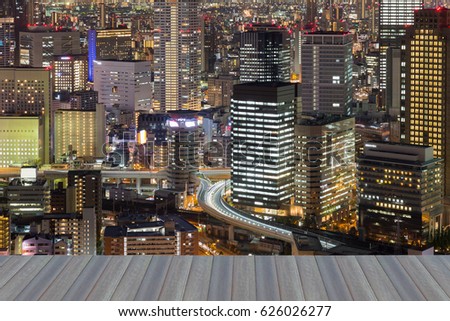 Opening wooden floor, Osaka city central business downtown night view, Japan