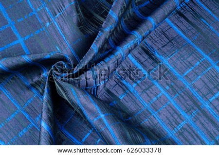 Texture, fabric, background. Woolen cloth. Dark blue stripes. Black Stripes