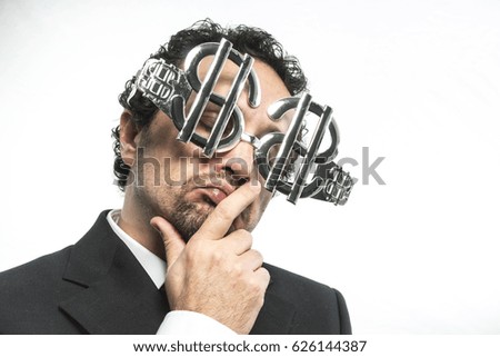 Money, Businessman with suit and glasses in the form of dollars. Expressions of stress, overwhelm and craving for money