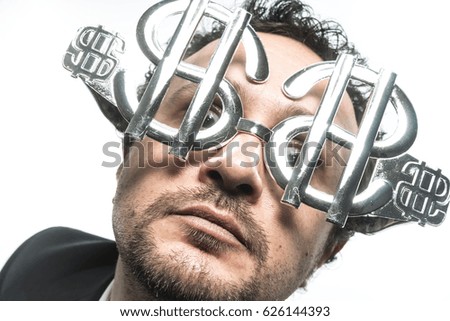 Profit, Businessman with suit and glasses in the form of dollars. Expressions of stress, overwhelm and craving for money
