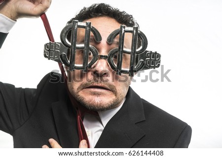 Businessman with suit and glasses in the form of dollars. Expressions of stress, overwhelm and craving for money