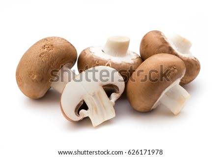 Fresh champignon mushrooms isolated on white. Royalty-Free Stock Photo #626171978