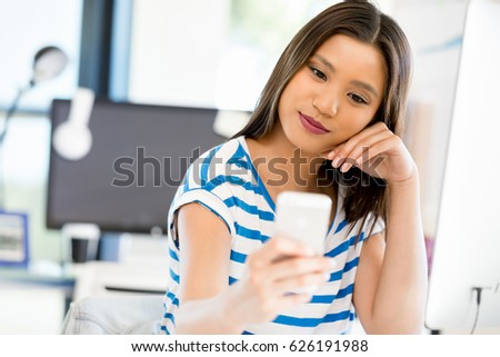 Young woman in office