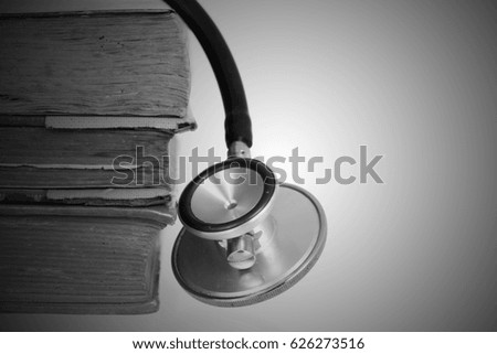 Medical research or ethic concept, Stethoscope with old books