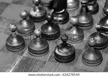 Old wooden chess on a chessboard, retro style
