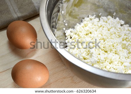 curd in a bowl of eggs