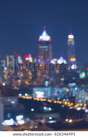 Twilight blurred bokeh light office building, abstract background