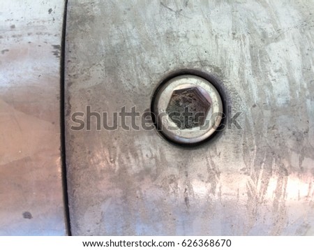 Metal plate and nut for texture background