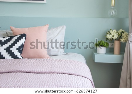 Comfortable bedroom in home with stylish decor.