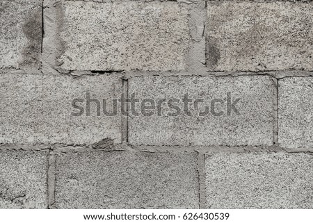 Old brick wall background. Grunge texture. Black wallpaper. Dark surface