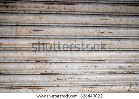 Black and white monochrome metal garage with stripes structure. Backgrounds and textures. Wall in Bangalore, Karnataka, India.  Royalty-Free Stock Photo #626443022