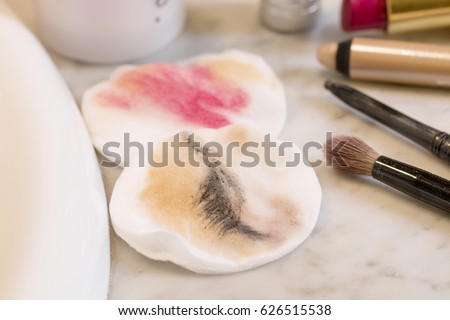Dirty cotton pads with make up. Royalty-Free Stock Photo #626515538