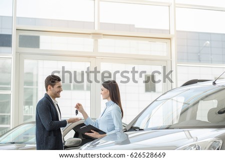 Young People in a Car Rental Service Transportation Concept
