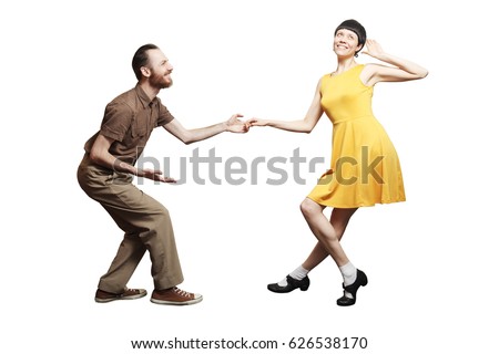 Rock'n'roll dance boogie woogie. Boogie acrobatic stunt in a studio background. Dance for rock-n-roll music. Royalty-Free Stock Photo #626538170