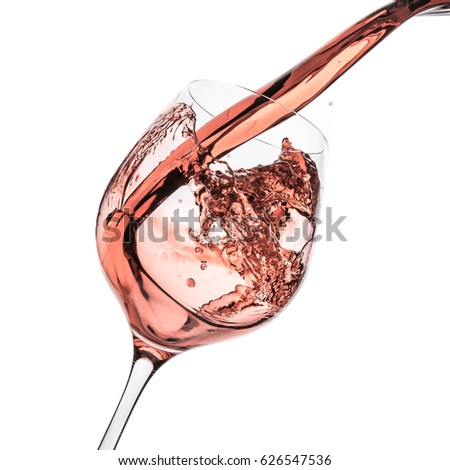 rose wine splashing on white background Royalty-Free Stock Photo #626547536