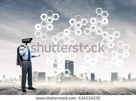 Elegant businessman outdoors with papers in hands and camera instead of head