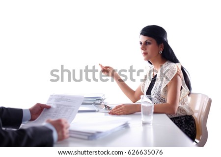 Woman with documents sitting on the desk