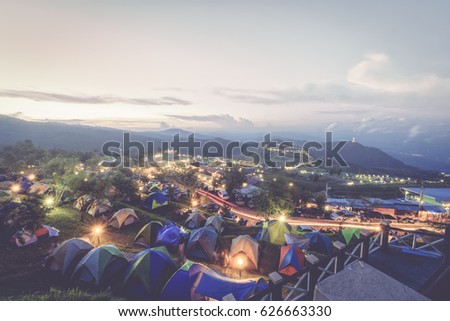 Tourist tent in camp on the hill. Night Hours Campsite. Recreation and Outdoor Photo Collection.