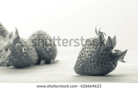 fresh strawberry close up in B&W color