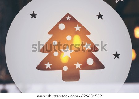 The light from room grow through Christmas tree sticker 