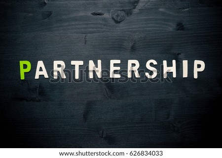 wooden word partnership on background business concept