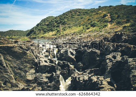 Pulo do Lubo waterfall at Guadiana river valley natural park in Alentejo Portugal