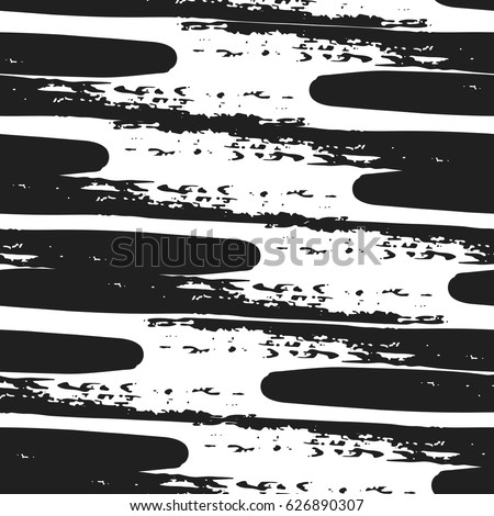 Decorative hand drawn seamless pattern. Endless ornament with black ink doodles on white backdrop. Hand painted stylish background for fabric, wrapping, packaging paper, wallpaper Royalty-Free Stock Photo #626890307