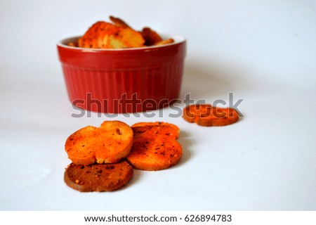 rusks with spices and tomatoes sauce