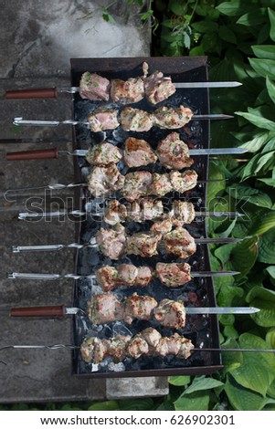 Shish kebabs in the grill, view from above