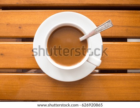 coffee cup on wooden background