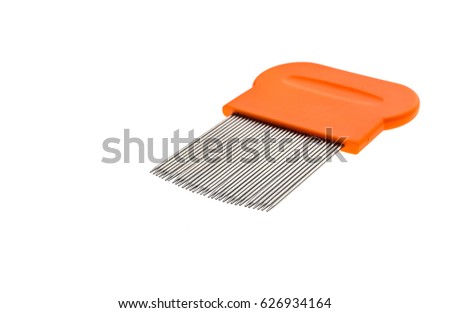 Lice comb for home removing lice treatment isolated on white. Metal tooth comb for lice and nits removing procedure.