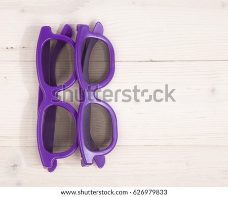 Two 3d glasses on wooden background
