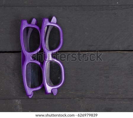 Two 3d glasses on wooden background