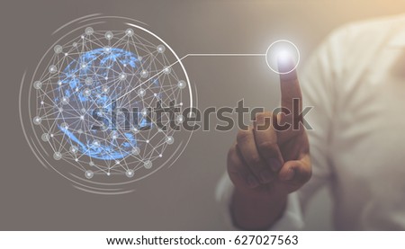 Businessman hand touching map point, network connection, international meaning, copy space / this image furnished by NASA  / soft focus picture / Vintage concept