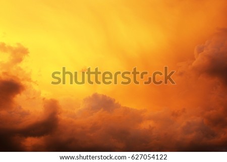 Golden clouds in the evening day with sunsets. Royalty-Free Stock Photo #627054122