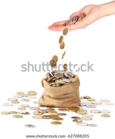 
Coins drop from hand to bag