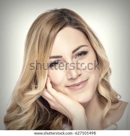 Attractive smiling woman. Added toning and vignetting.