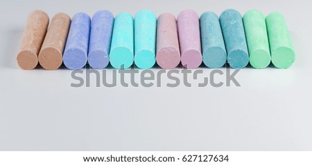 Cylindrical Colorful Crayons Isolated On White Background