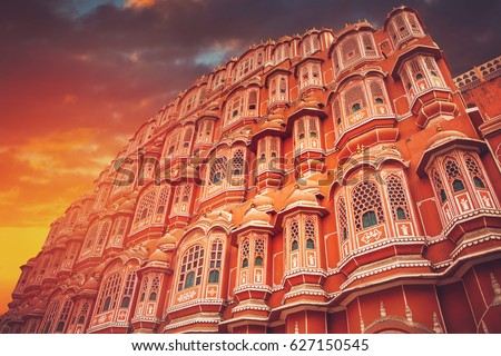 Hawa Mahal - a five-tier harem wing of the palace complex of the Maharaja of Jaipur, built of pink sandstone in the form of the crown of Krishna Royalty-Free Stock Photo #627150545