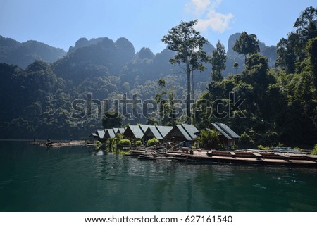 Bungalow at the water with beautiful blue sky  